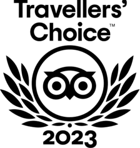 Travellers' Choice 2023" award logo featuring an owl surrounded by laurel branches.