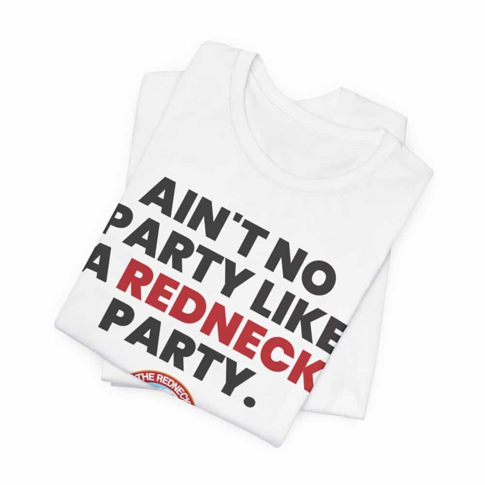 Folded Ain't No Party - Redneck Tshirt in white, featuring the printed text "AIN'T NO PARTY LIKE A REDNECK PARTY." with "REDNECK" highlighted in red.