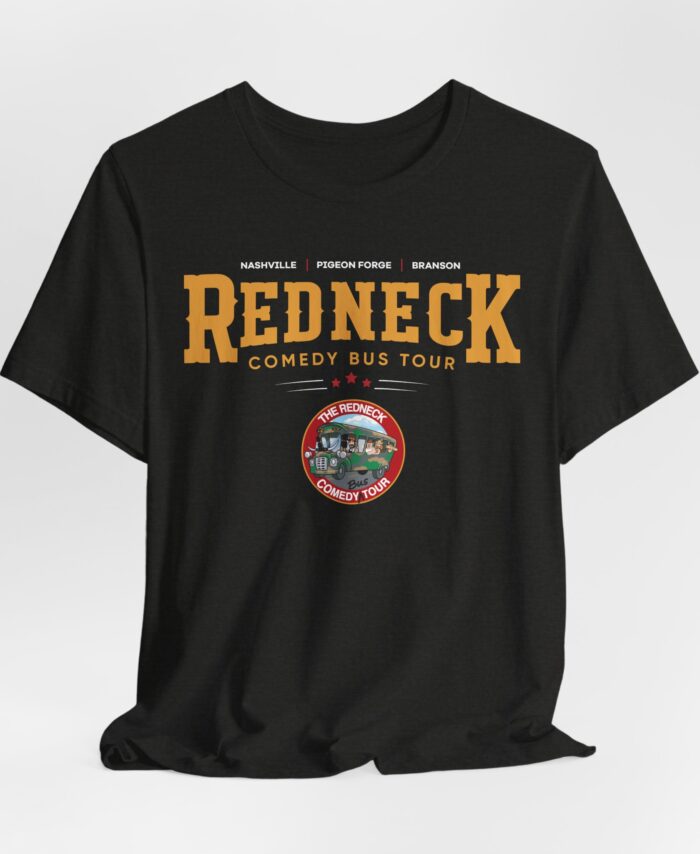 The Redneck Comedy Bus Tour Tshirt is a black tee featuring "Redneck Comedy Bus Tour" text, a list of cities above, and a circular logo with a cartoon bus and the tour name beneath the main text.