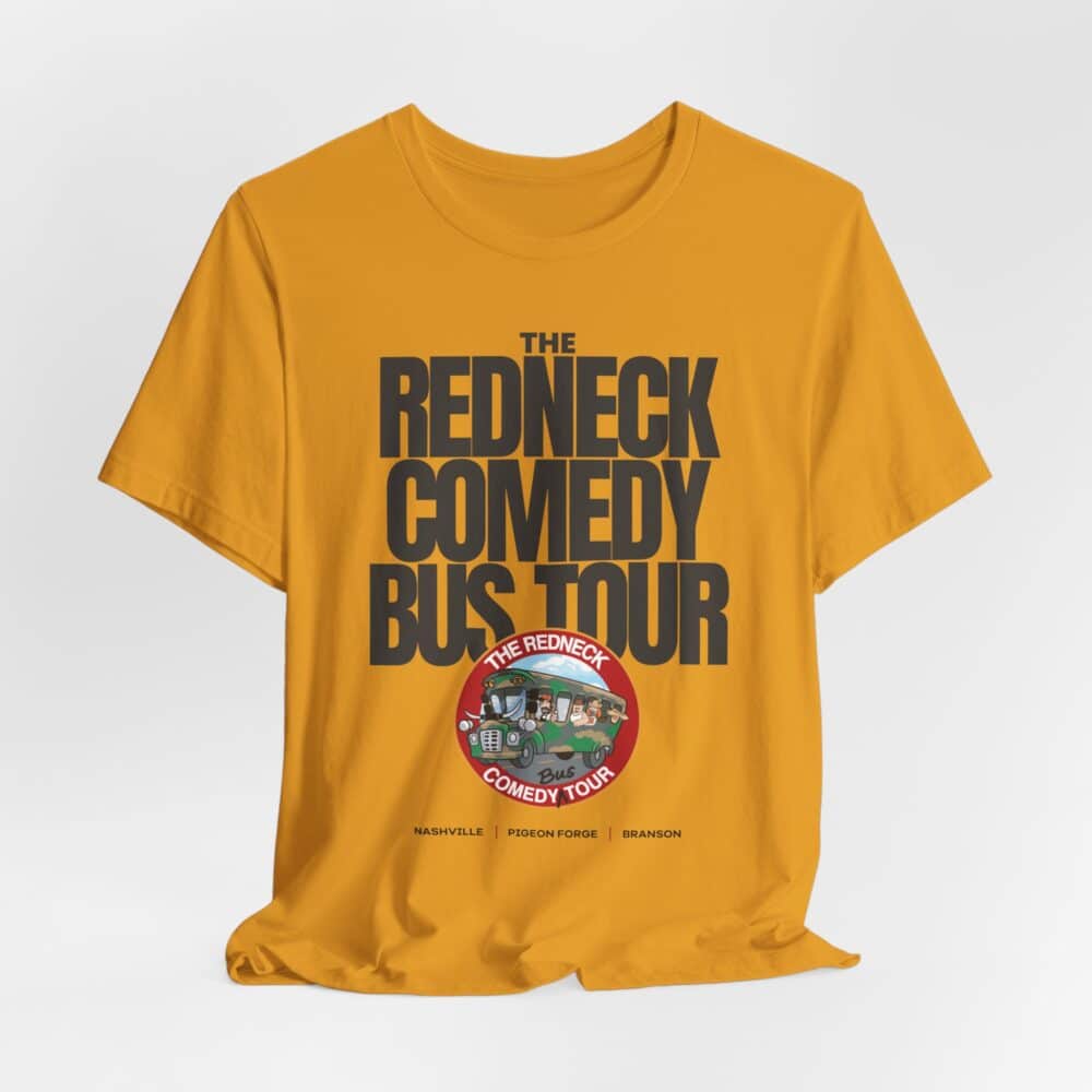 The Redneck Comedy Bus Tour Tshirt is yellow with bold black "The Redneck Comedy Bus Tour" text, a circular tour logo, and Nashville, Pigeon Forge, and Branson city names printed at the bottom.