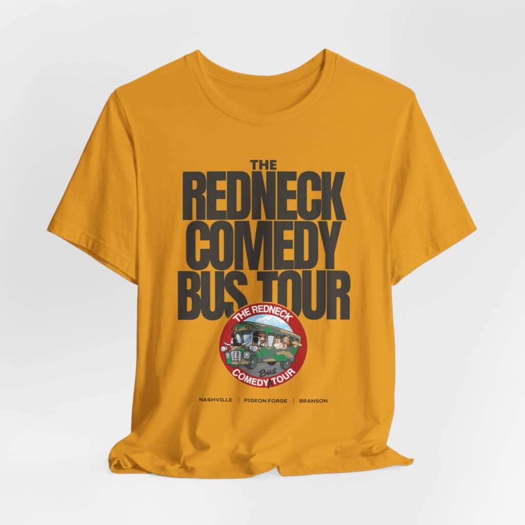 The Redneck Comedy Bus Tour Tshirt is yellow with bold black "The Redneck Comedy Bus Tour" text, a circular tour logo, and Nashville, Pigeon Forge, and Branson city names printed at the bottom.