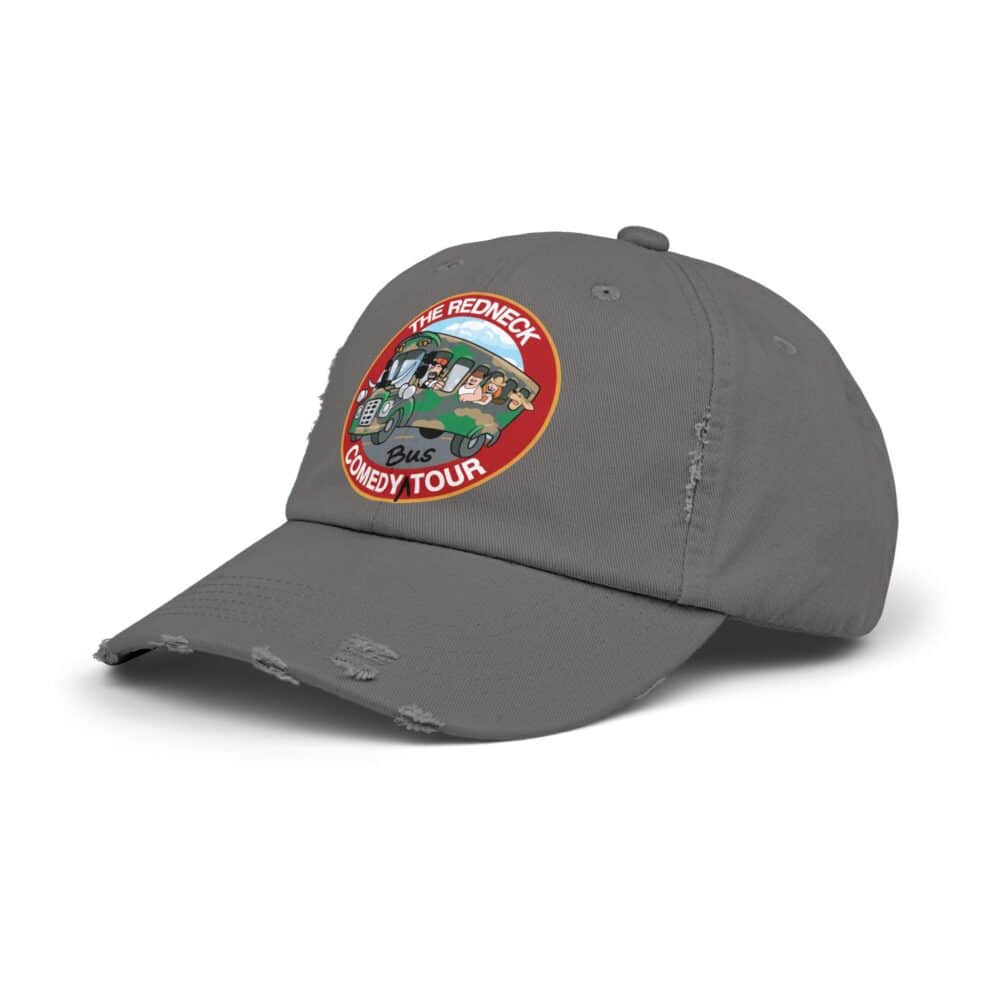 The Redneck Comedy Tour Distressed Hat is a gray baseball cap with a colorful embroidered patch showing cartoon characters on a bus and "The Redneck Bus Comedy Tour" text.