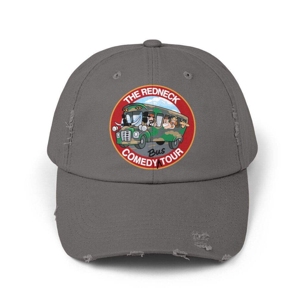 The Redneck Comedy Tour Distressed Hat is a gray baseball cap with a round patch showing cartoon characters on a bus and the text "The Redneck Comedy Tour.