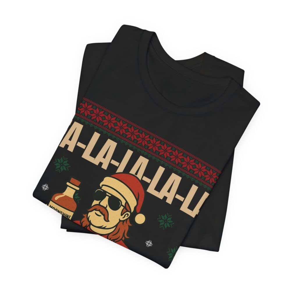 The Christmas Ugly Sweater Redneck Tshirt is a folded black tee with a festive design showing a person in sunglasses and Santa hat, holding a "hooch" bottle, plus "FA-LA-LA-LA-LA" text and holiday patterns.